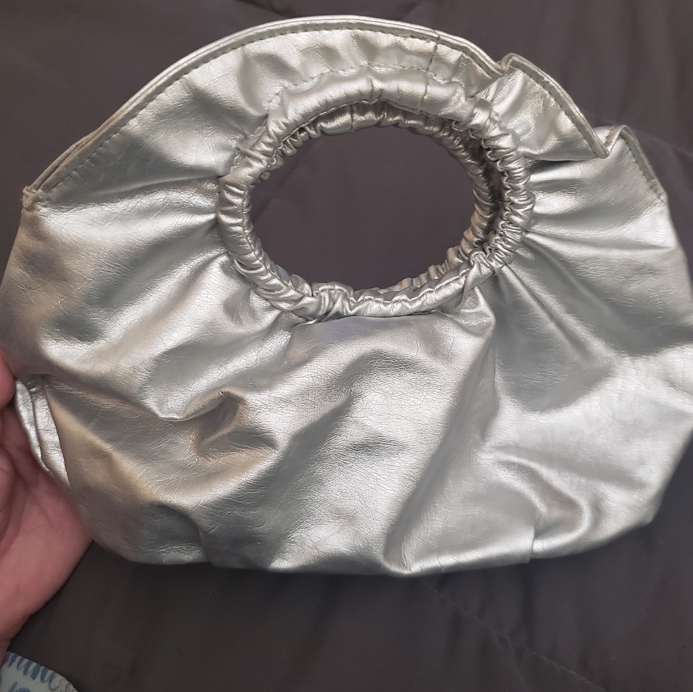 Silver clutch purse.